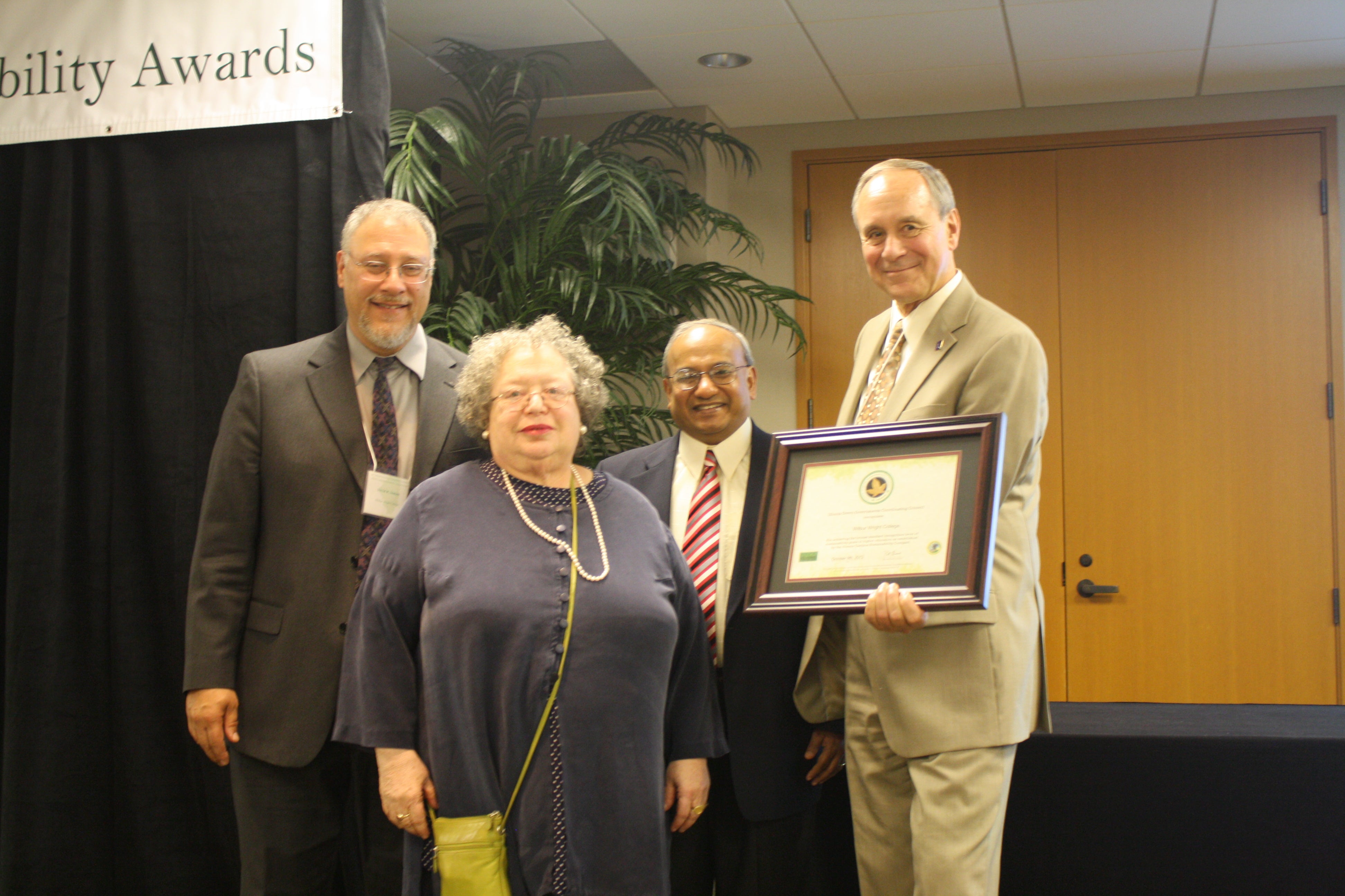 Davin Inman and Dr. Victoria Cooper Receive Award